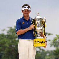 Name on the trophy, Louis Oosthuizen celebrates following victory in Malaysia