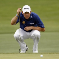 Lee Westwood lining up a putt in Houston
